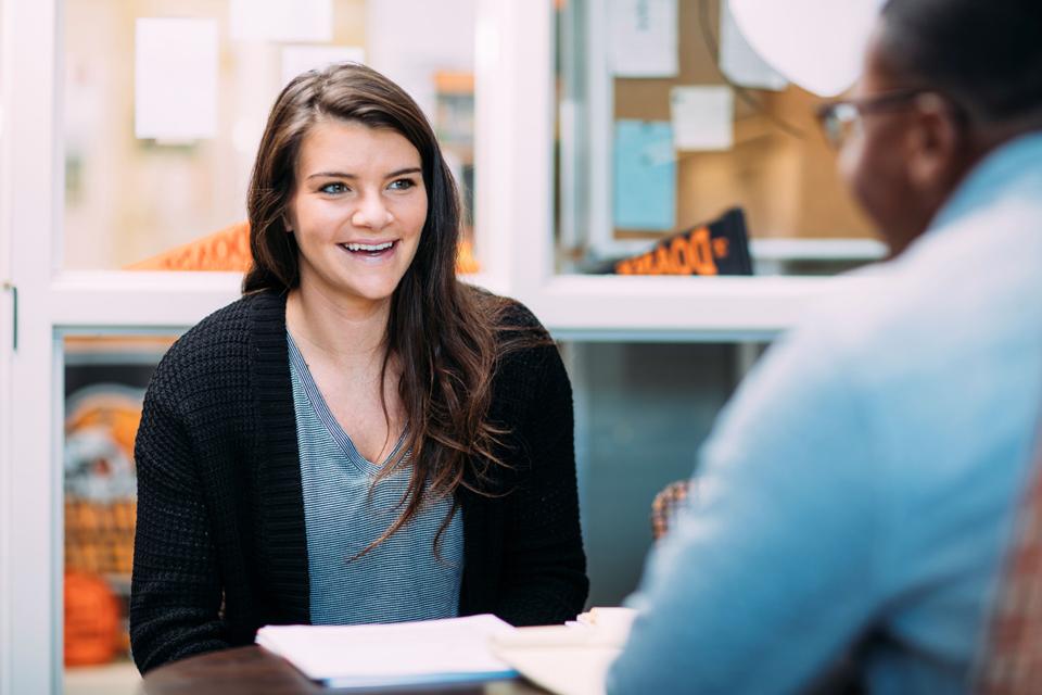 student talking to advisor